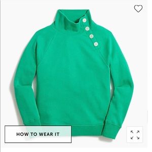 Wide button-collar pullover sweatshirt in cloud spun fleece.